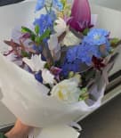medium boquet with blue flowers